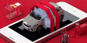 Carro sendo lavado em cima de uma tela de celular. Representação do serviço automotivo de lavagem de carro.