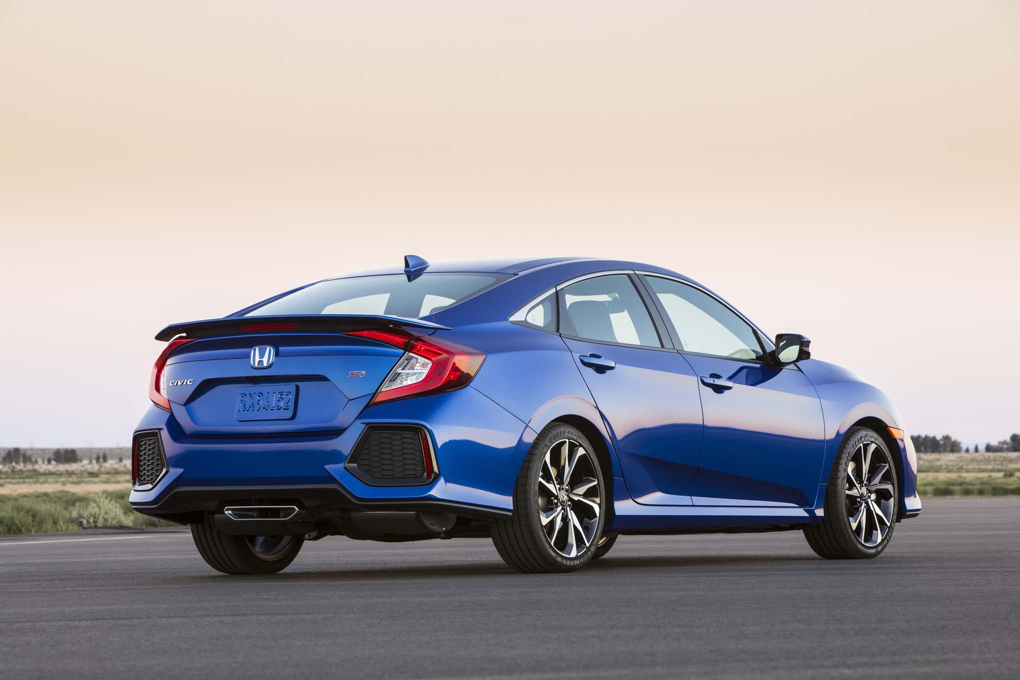 2017-honda-civic-si-rear-three-quarter-02.jpg