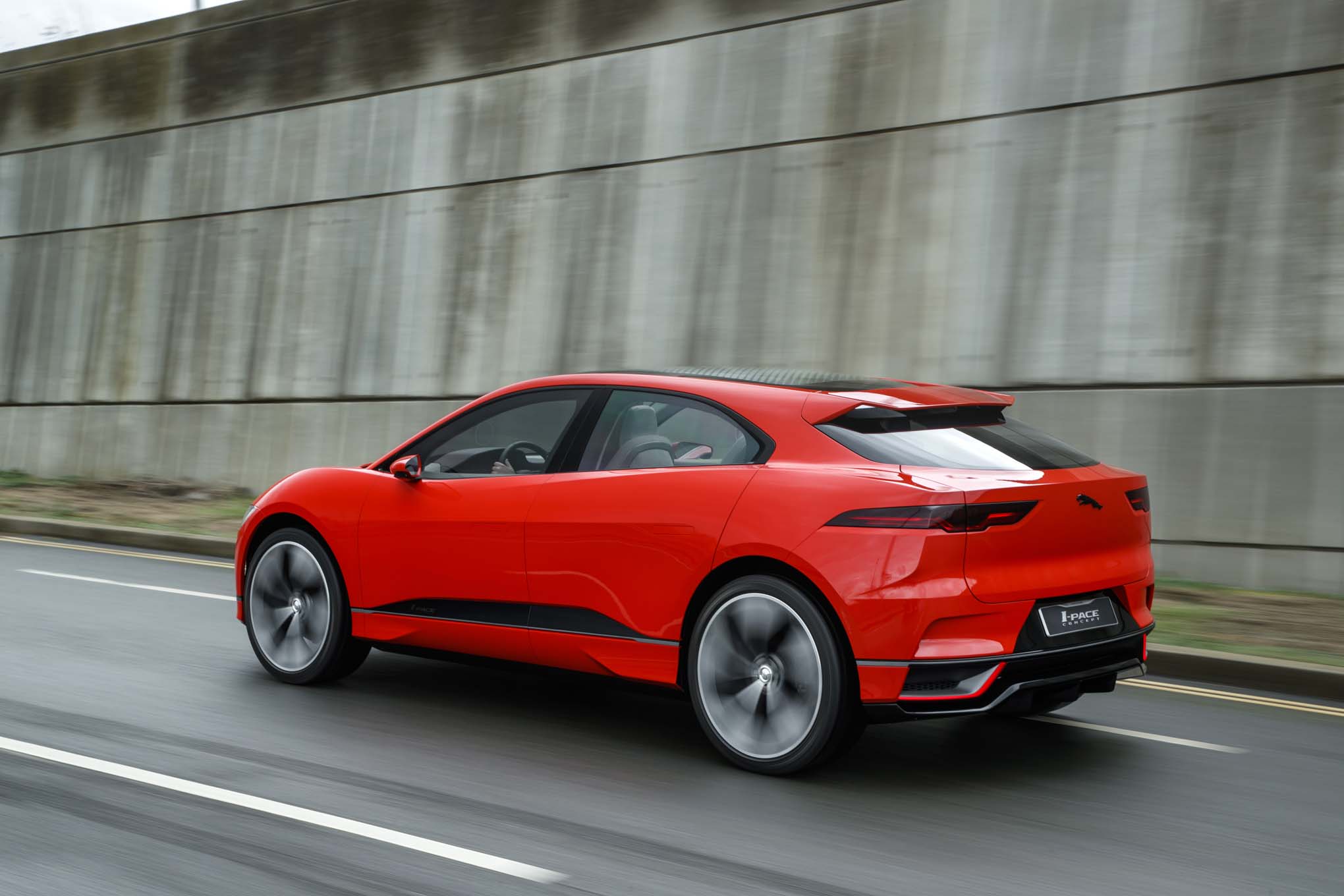jaguar-i-pace-concept-rear-three-quarter-in-motion-04-182