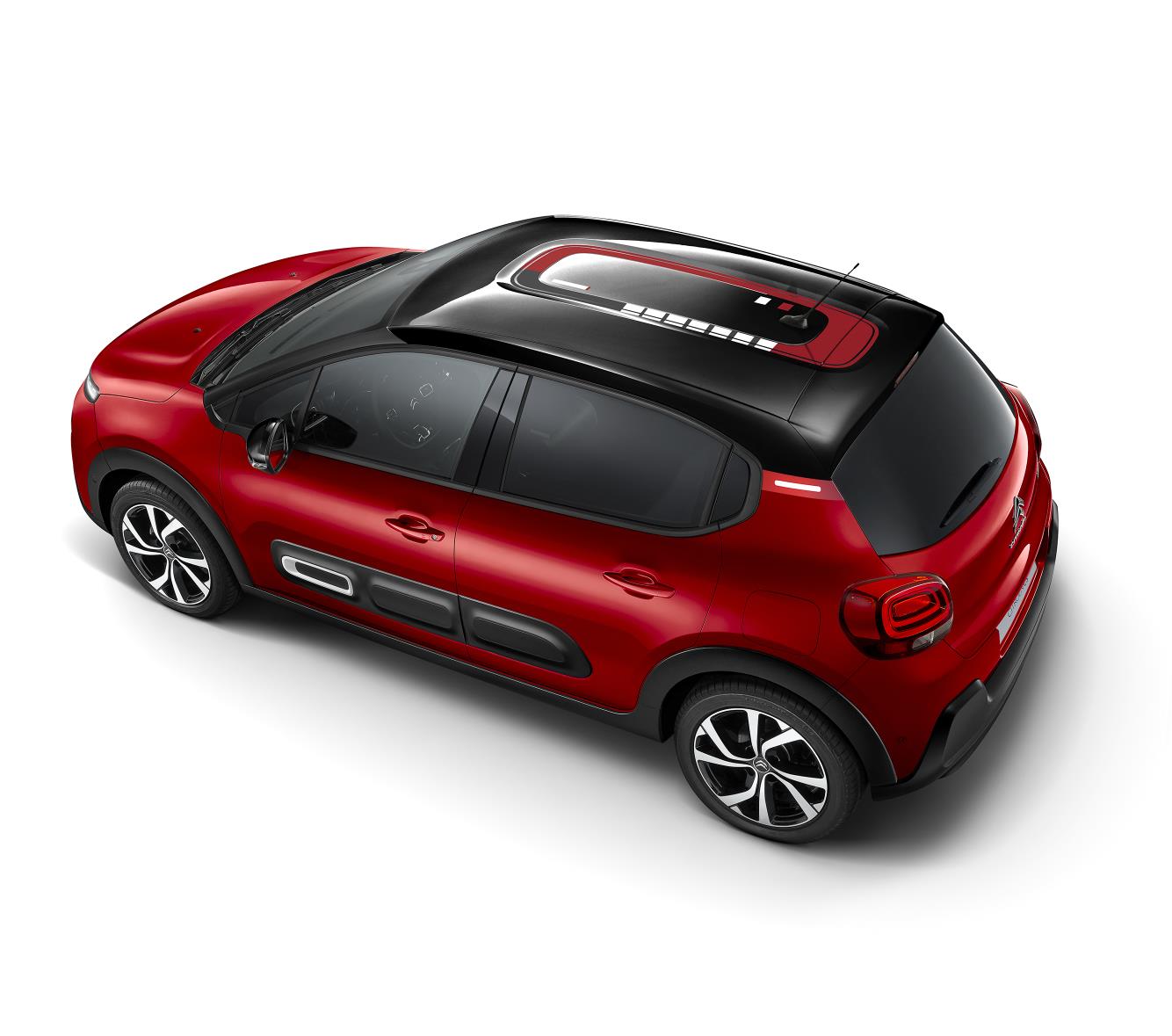 Citroën C3 visto de cima na cor vermelha e com teto preto e com grafismo que lembra o Airbump