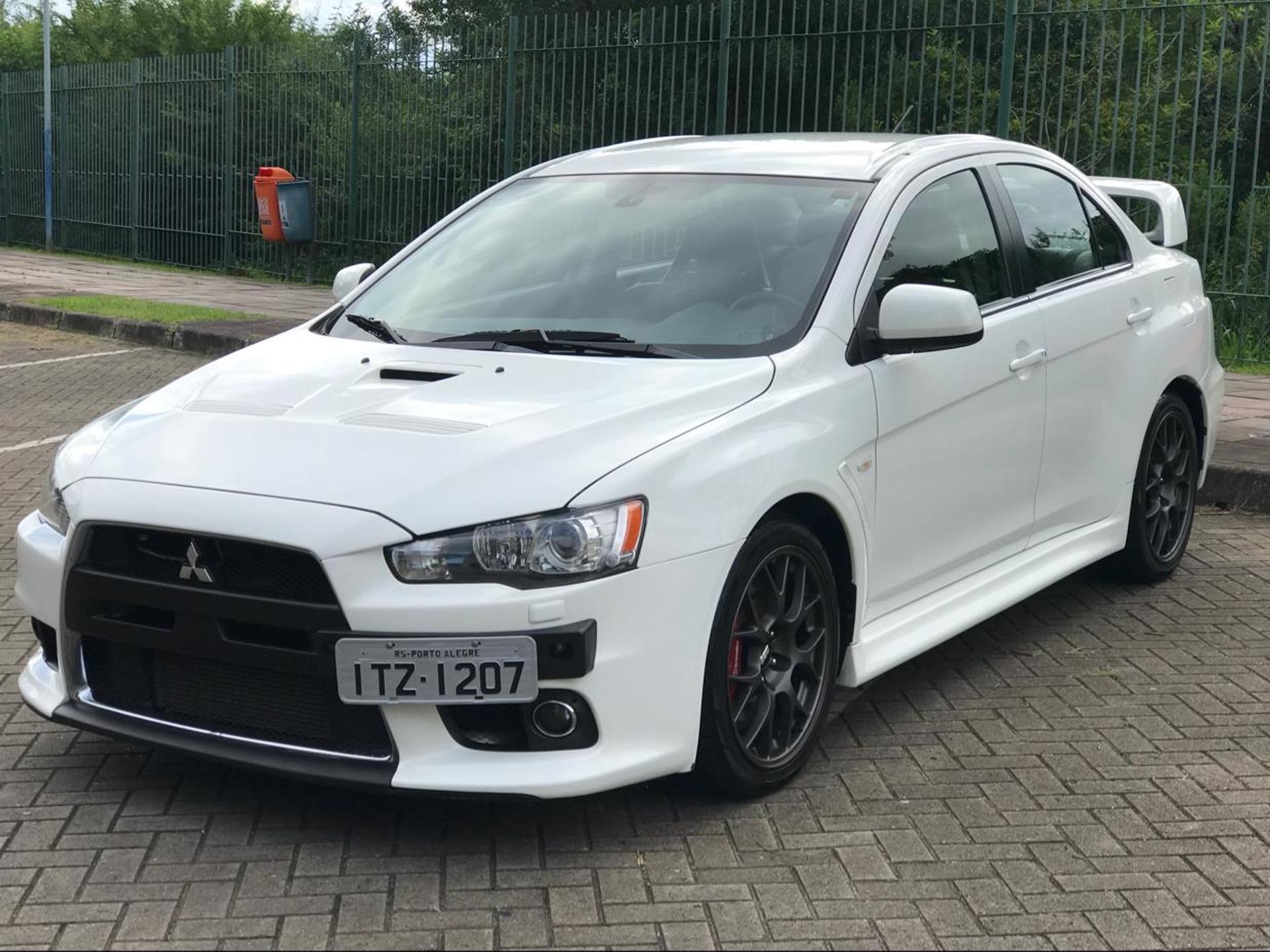 VW Virtus GTS 0 km ou Mitsubishi Lancer Evo usado?