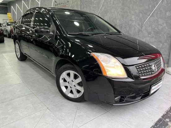 Nissan Sentra preto com câmbio automático à venda por até R$ 40 mil, excelente oportunidade de compra de carro usado em ótimo estado. Confira detalhes.