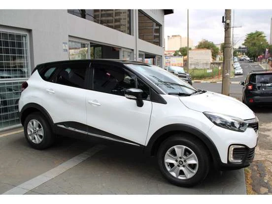 Renault Captur branco com preço até 90 mil reais, ideal para quem busca um SUV compacto econômico e moderno.